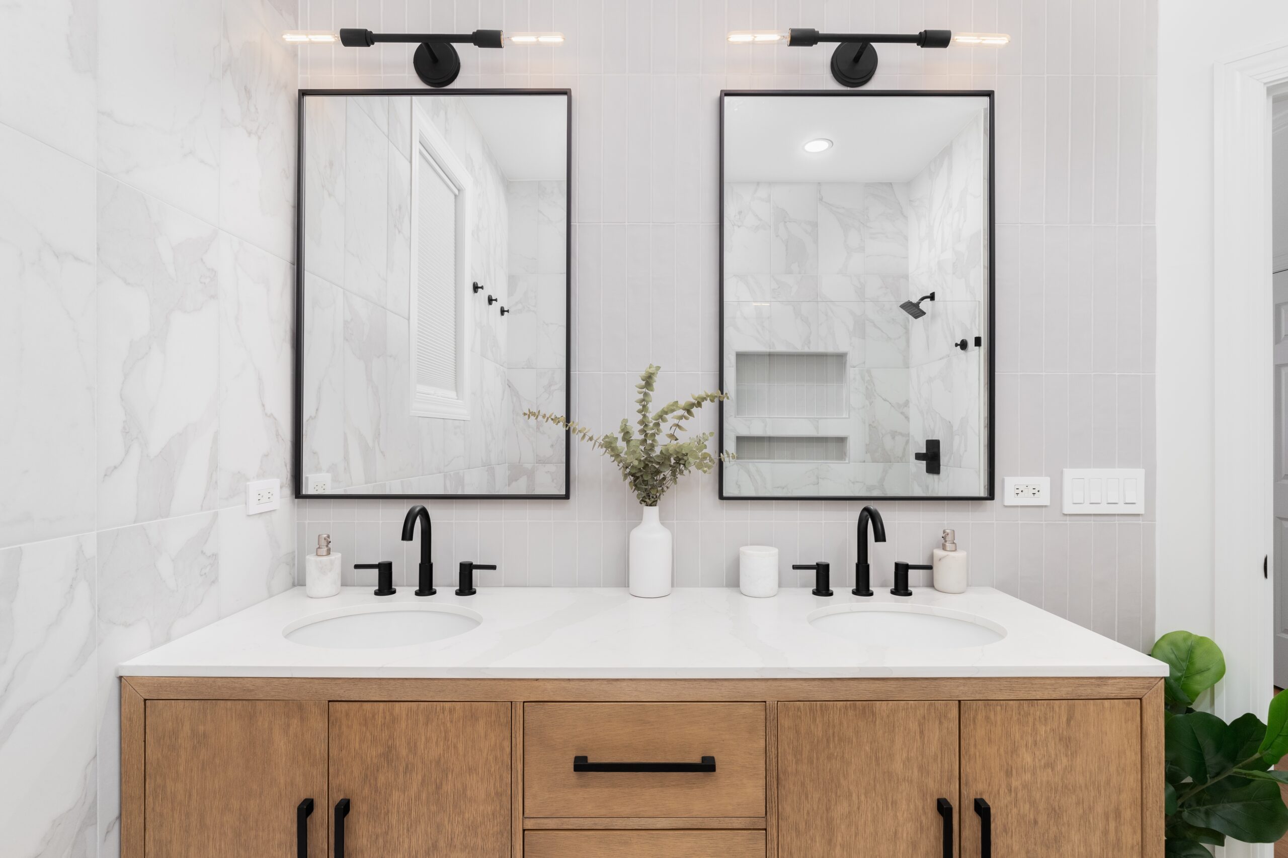 A,Bathroom,With,Marble,And,Stacked,Vertical,Subway,Tiles,,A